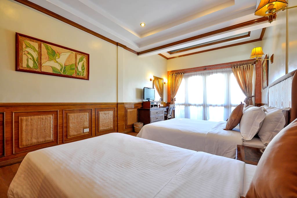 A Premier Room just steps away from White Beach Station 2.