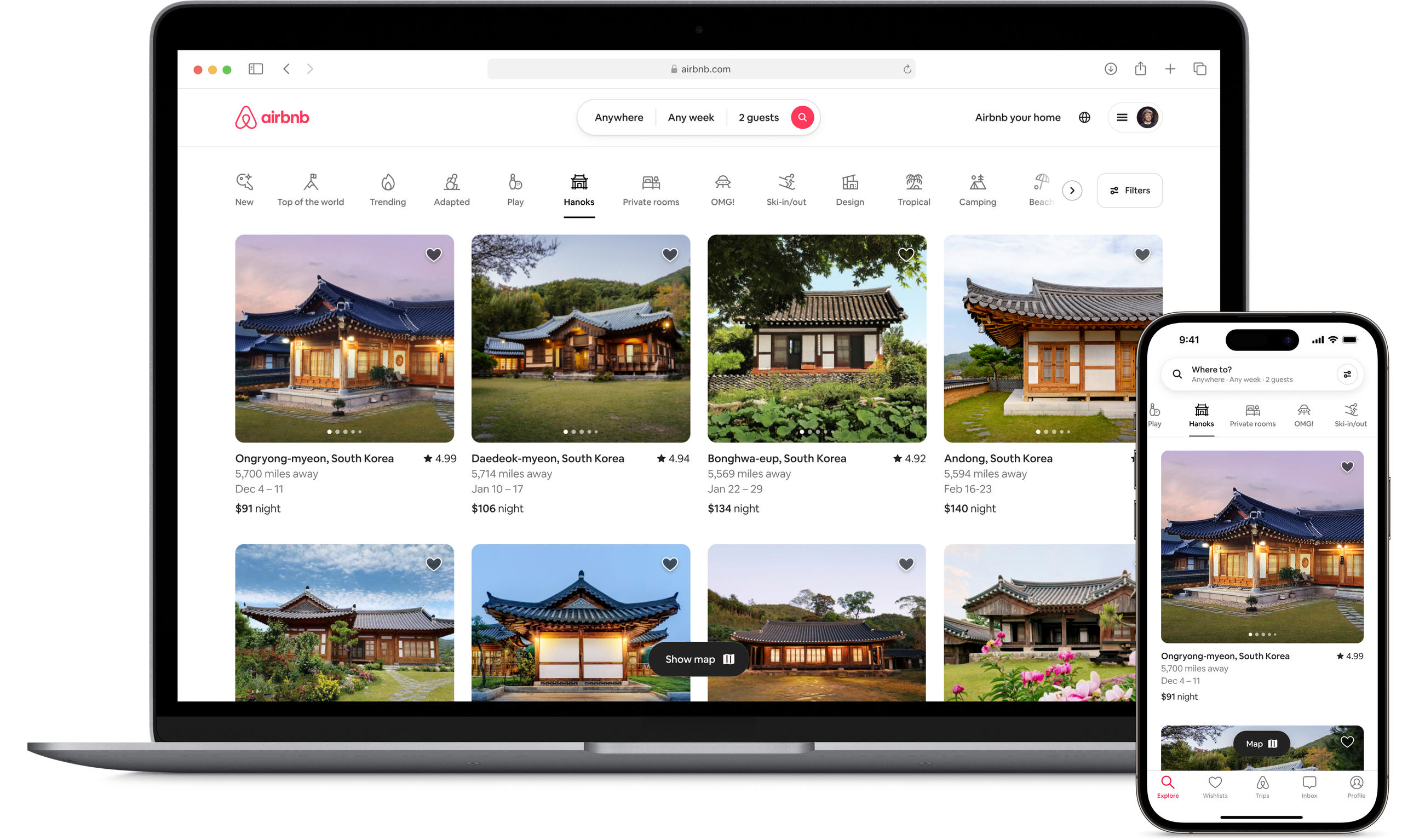 A laptop and a phone show the Airbnb homepage with two rows of homes from a new Airbnb Winter Release category called Hanoks, which features traditional 14th century South Korean homes made of natural materials.