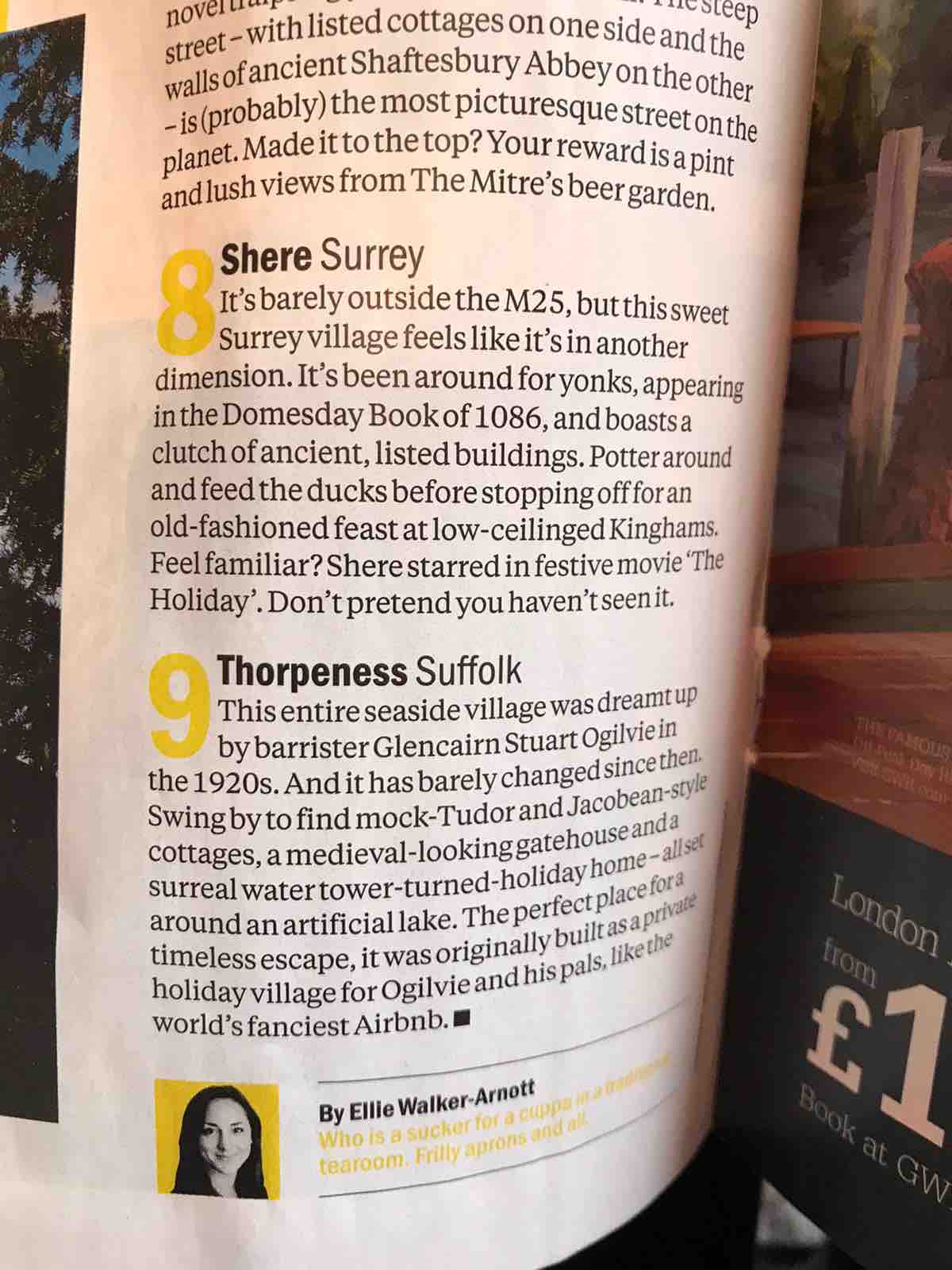 A page from a travel guidebook displays an overview of Shere in Surrey. Its charming attributes are noted, including historical references and a mention of the film 'The Holiday.' The text is accompanied by a map and offers a glimpse into the village's appeal.
