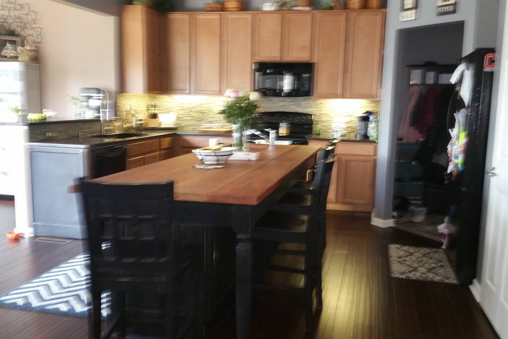 large kitchen with large dining room on the left