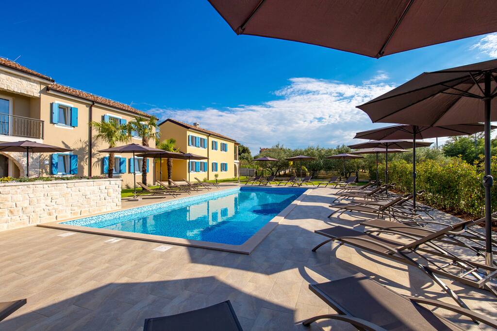 Spacious sun deck with pool