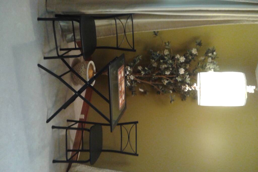 Bistro table located in Garden Room.