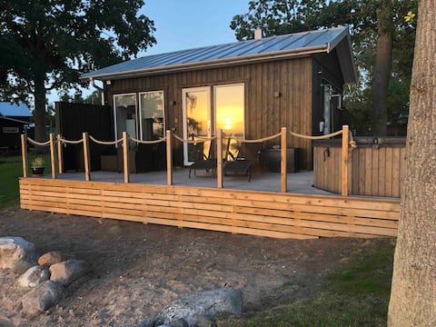 Cozy cottage 30 sqm with patio and beach plot