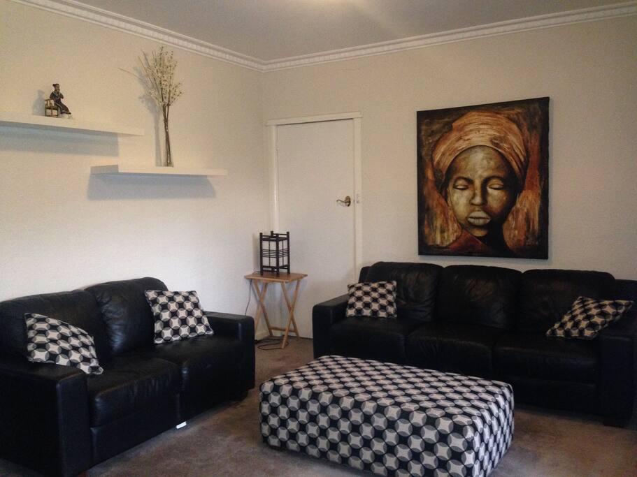 Comfortable lounge room with toys and games area