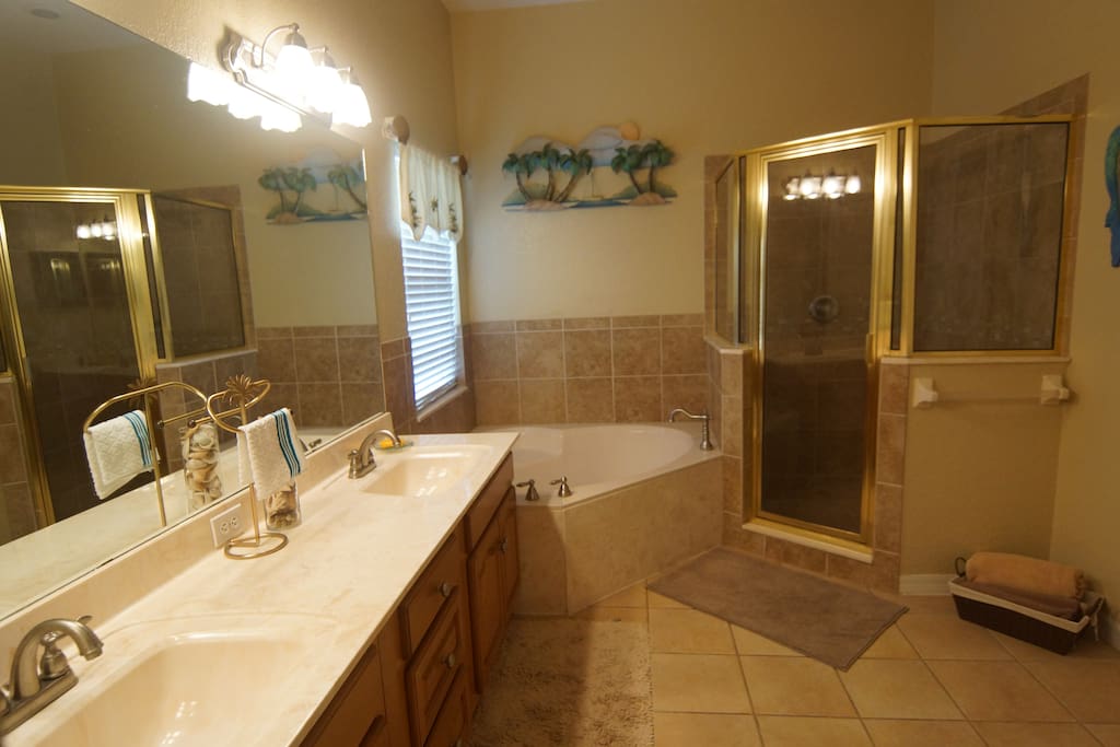 Master bath with garden tub and walk in shower.