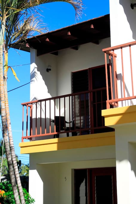Private balcony with chairs and table