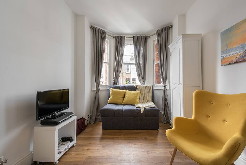 Living room with large double sofa bed