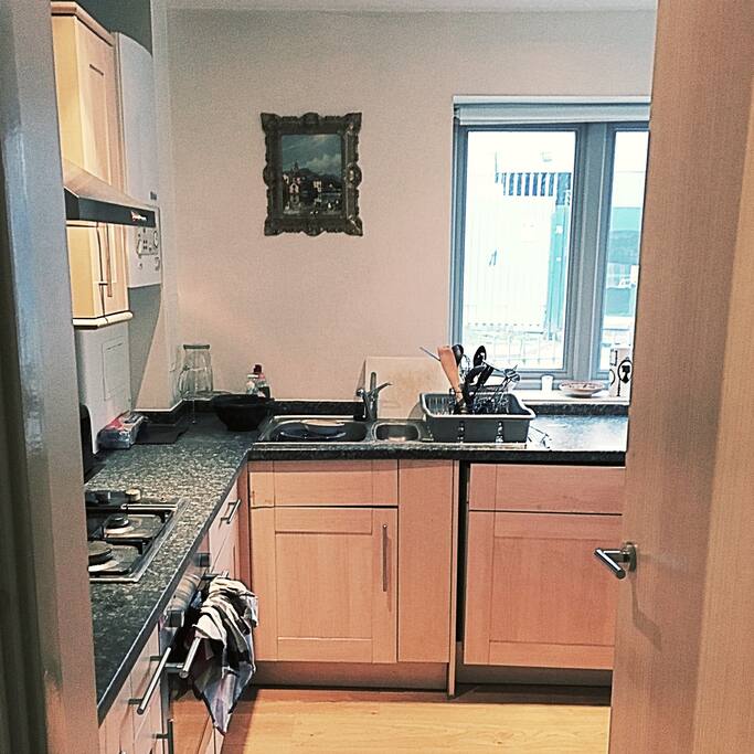 A modern, scrupulously-clean, fully-equipped kitchen.