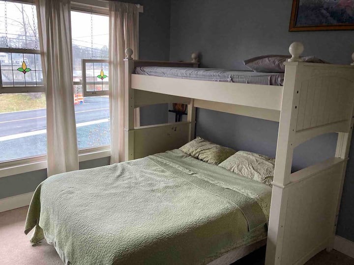 Queen bed with single above in second bedroom 