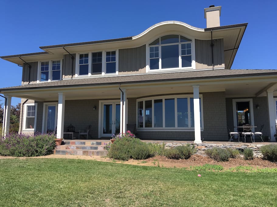 Porch facing lawn an ocean view