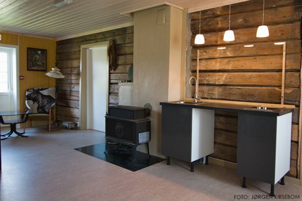 Common area. Dishwasher now installed. Ideal for preparing meals.