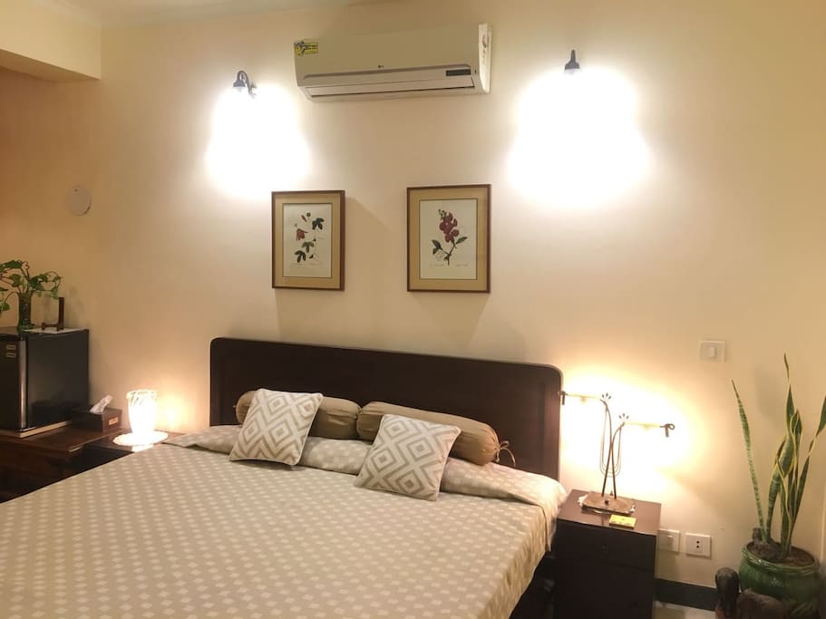 Private Bedroom with a Mini Fridge