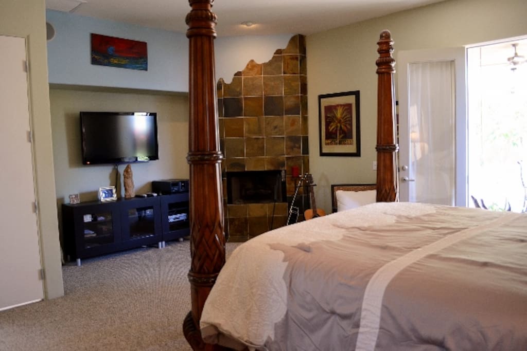 Master Bedroom features, King size bed, fireplace and French doors to patio