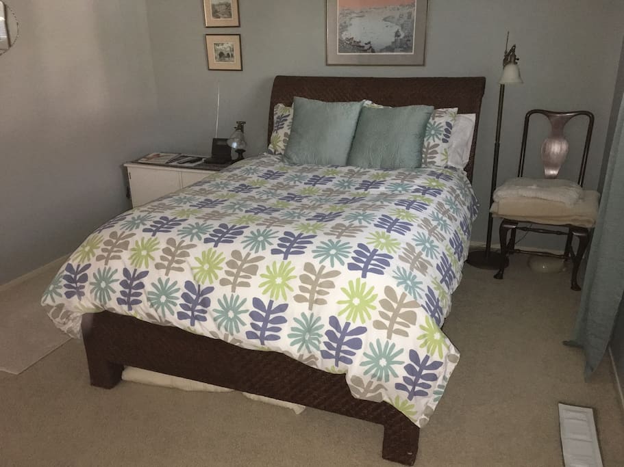 Double bed with down comforter.