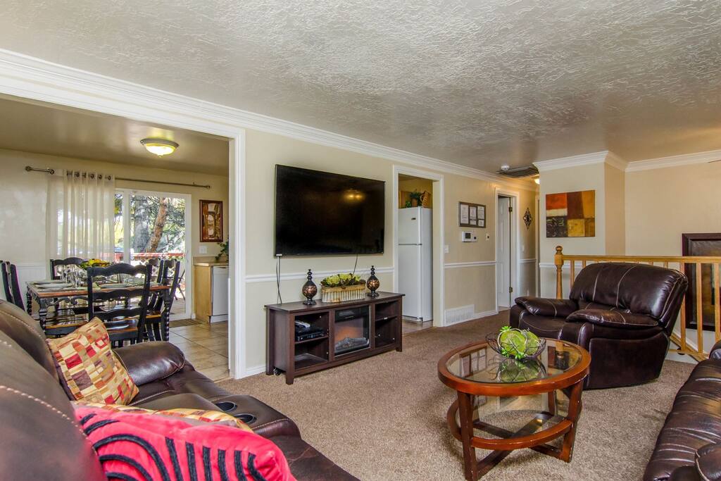 Family room with sectional sofa and 55 inch TV