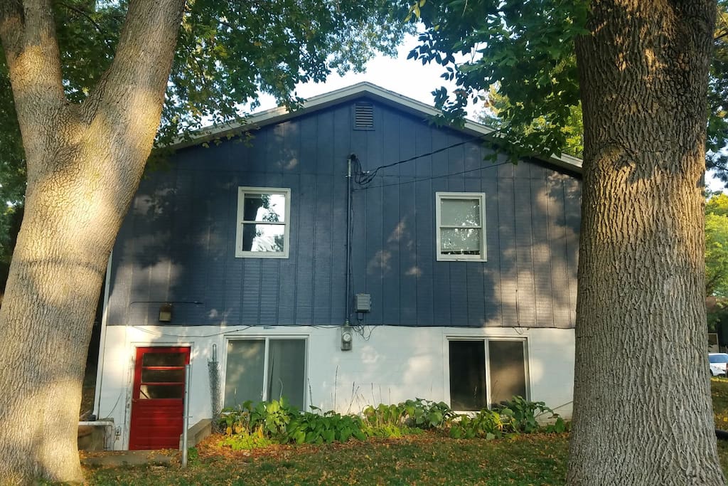 Entrance to the Airbnb behind the red door