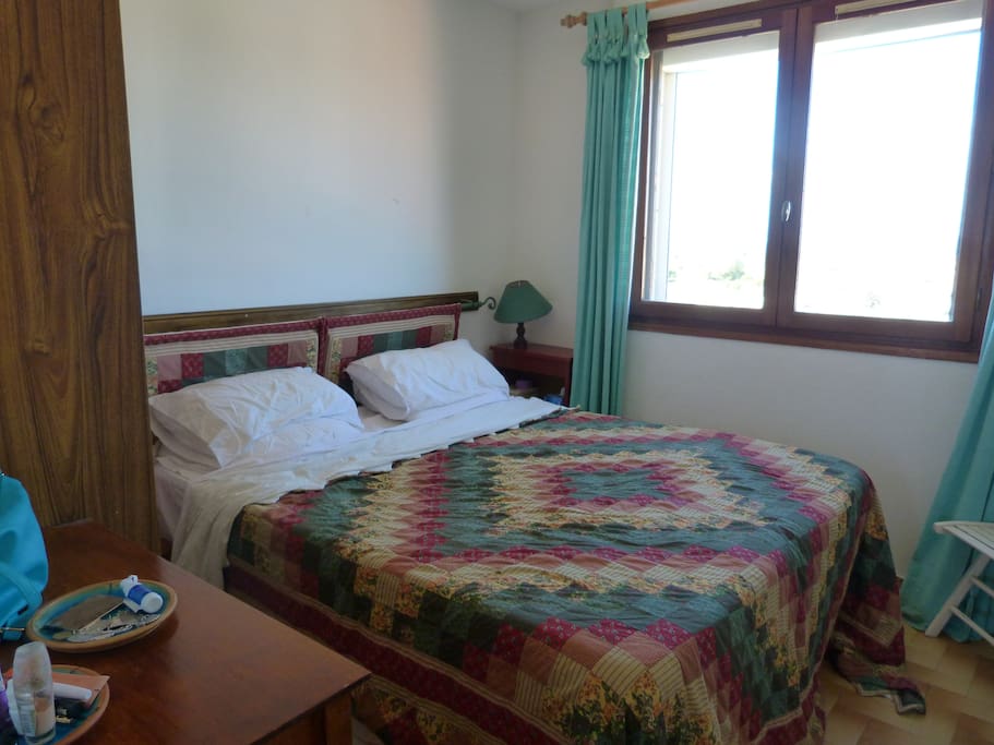 Main bedroom with wardrobe and chest of drawers