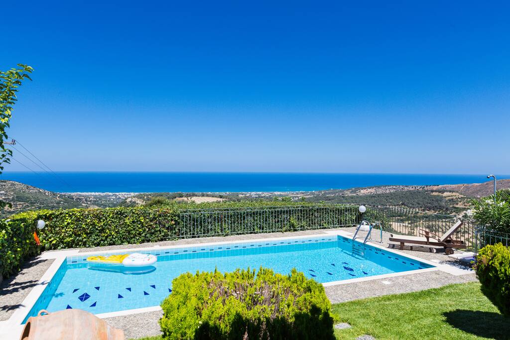 Pool area surrounded by our green garden