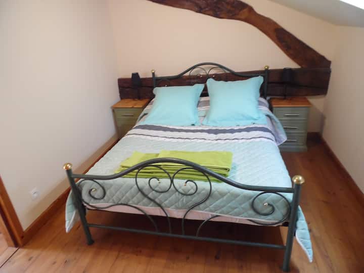 Bedroom 1 with roof window, chest of draws, fan, built in hanging space and room for optional travel cot.