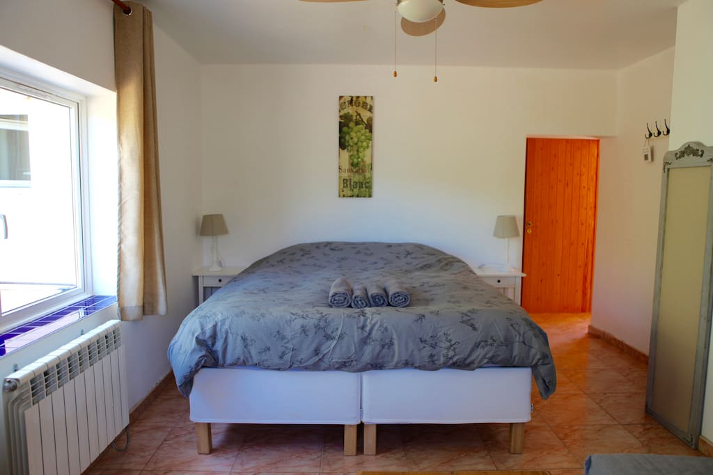 Room 2, a kingsize bed and a sofa bed, two windows and a private bathroom