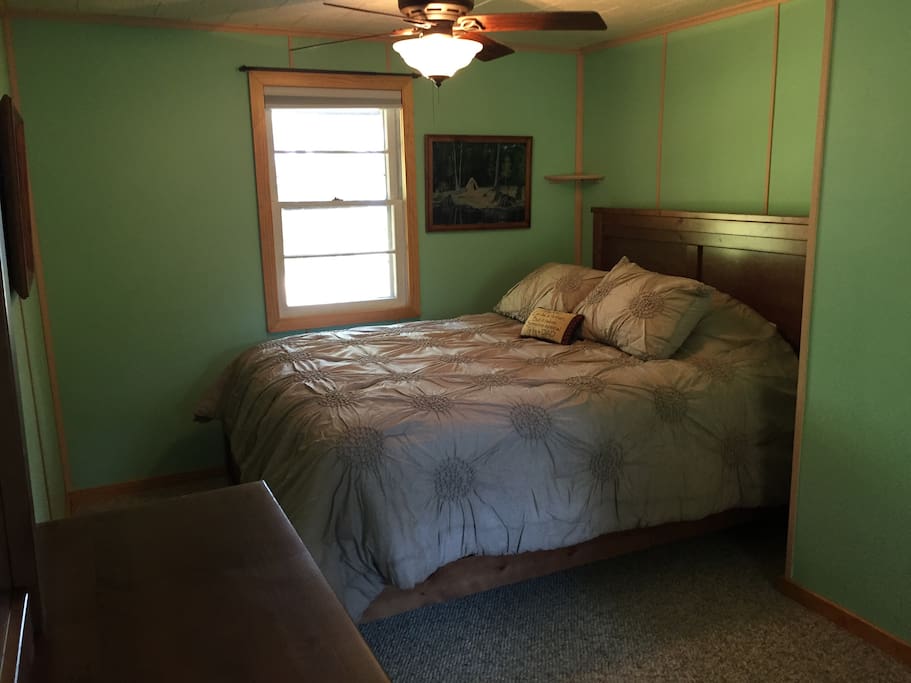 Guest Bedroom. Brand new feather top bed.