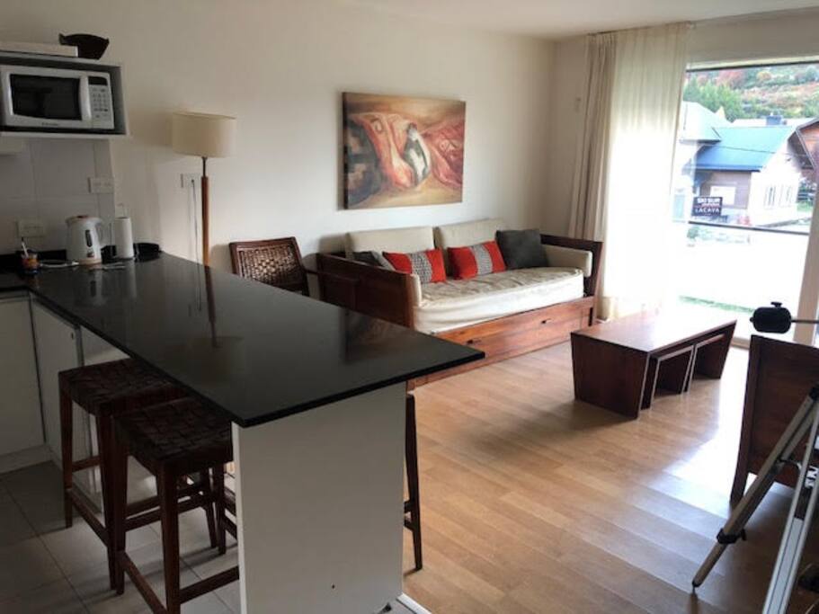 Living con 2 sillon cama y una cama carrito