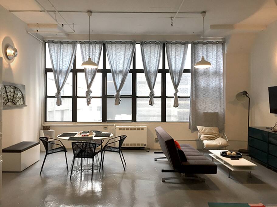 Open dining and living space. Apartment gets nice light throughout the day.