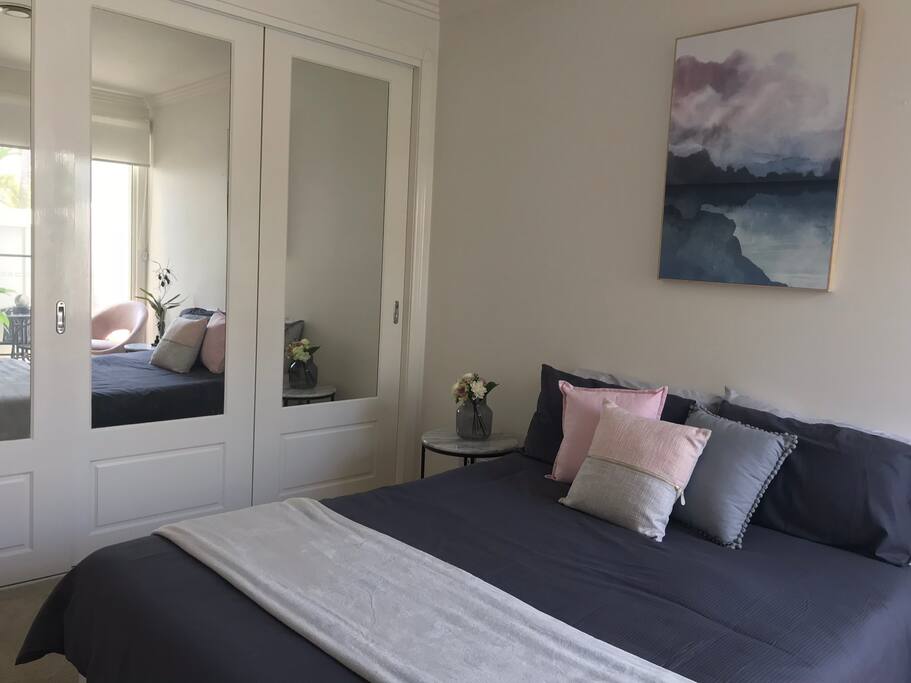 Large mirrored wardrobe available which also includes drawers and shelving