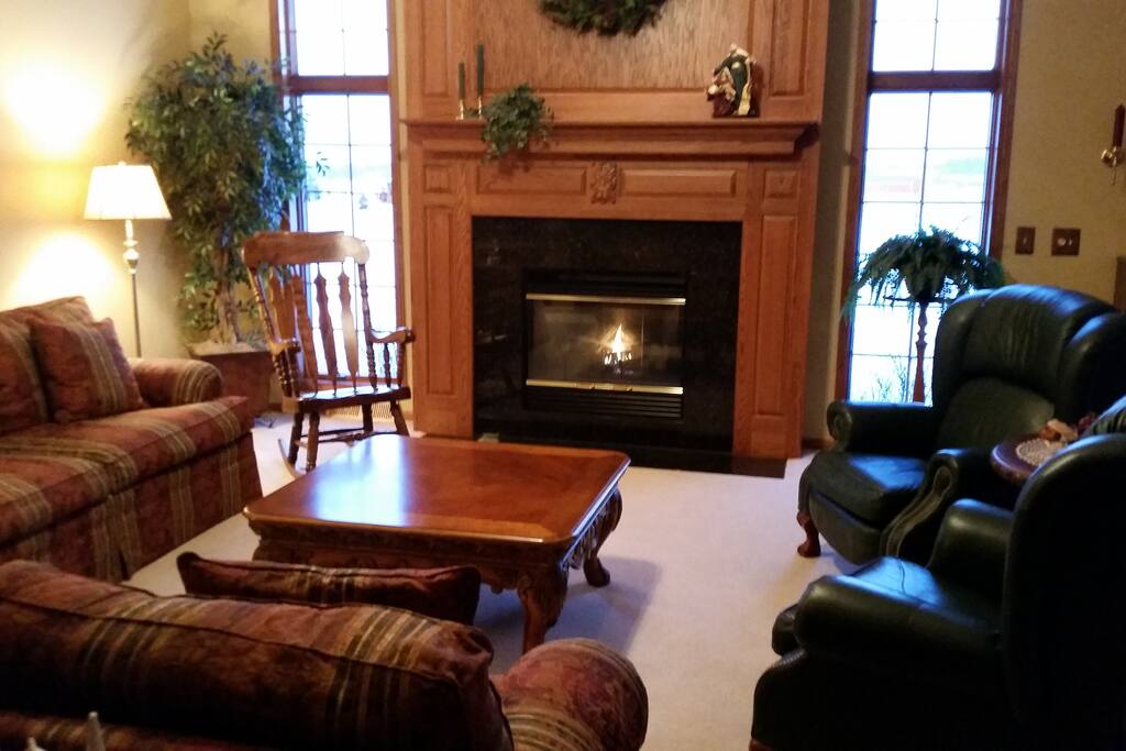 Living room with couch and gas fireplace