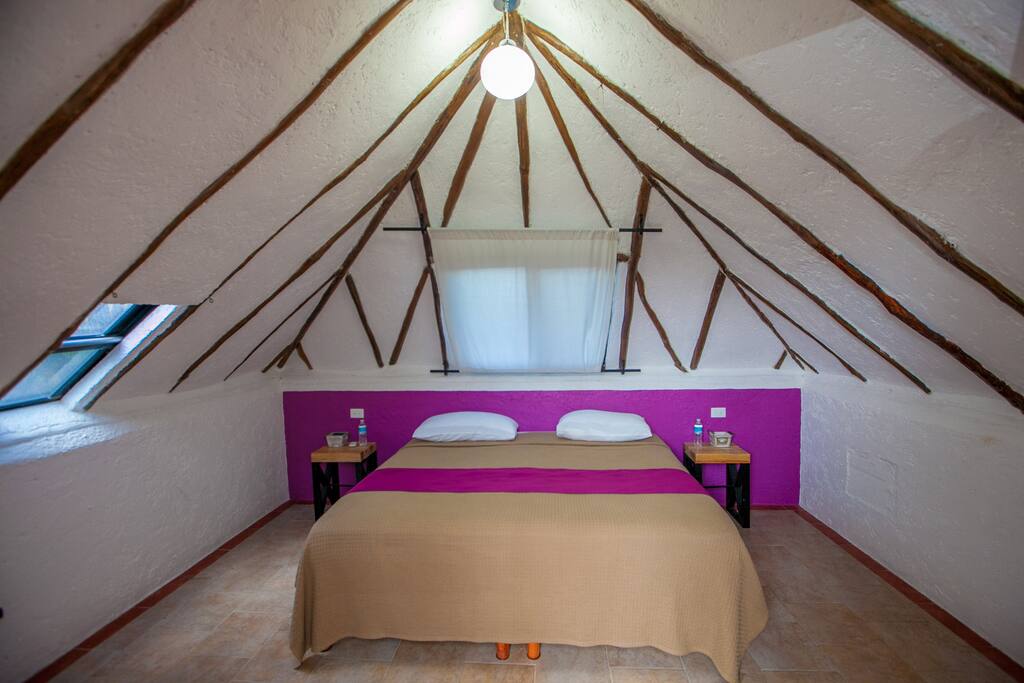 Upstairs, room #3. King size bed, the most cosy room in the property!