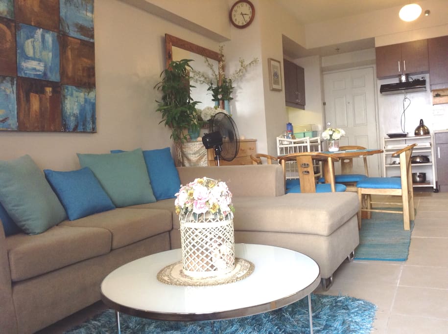 Air conditioned sala, dining and kitchen area