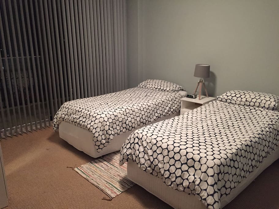2 real single beds or a Queen bed Just tell us how you want it configured.