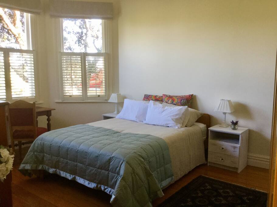 Bedroom with Bay window overlooking the park.