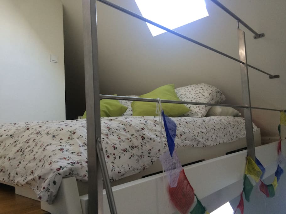 View of bed on extra floor