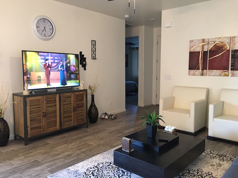 Entry to living room. 55" Smart Roku TV