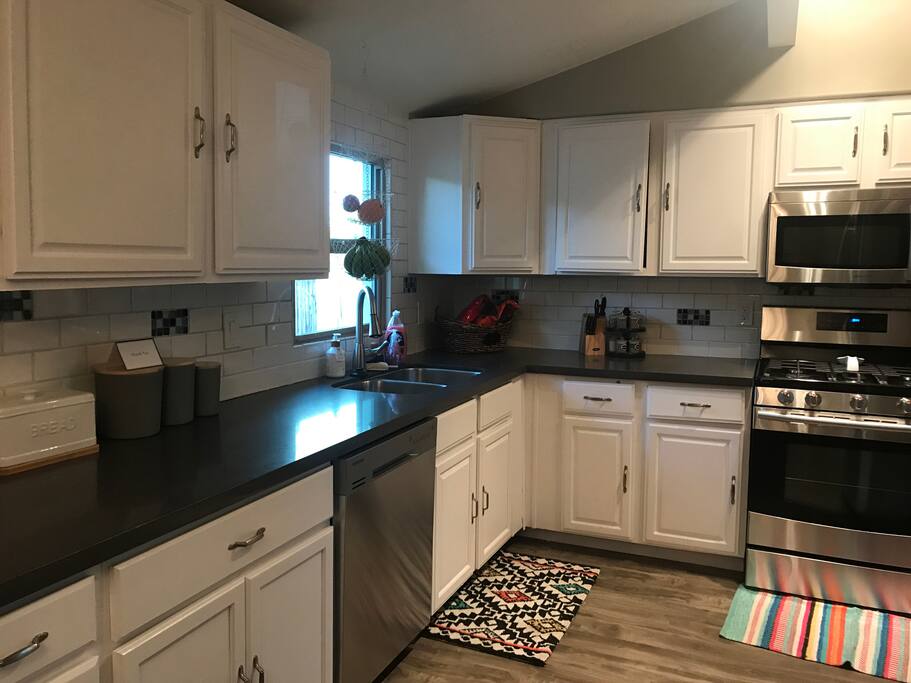 Microwave and other basic appliances available in the kitchen.