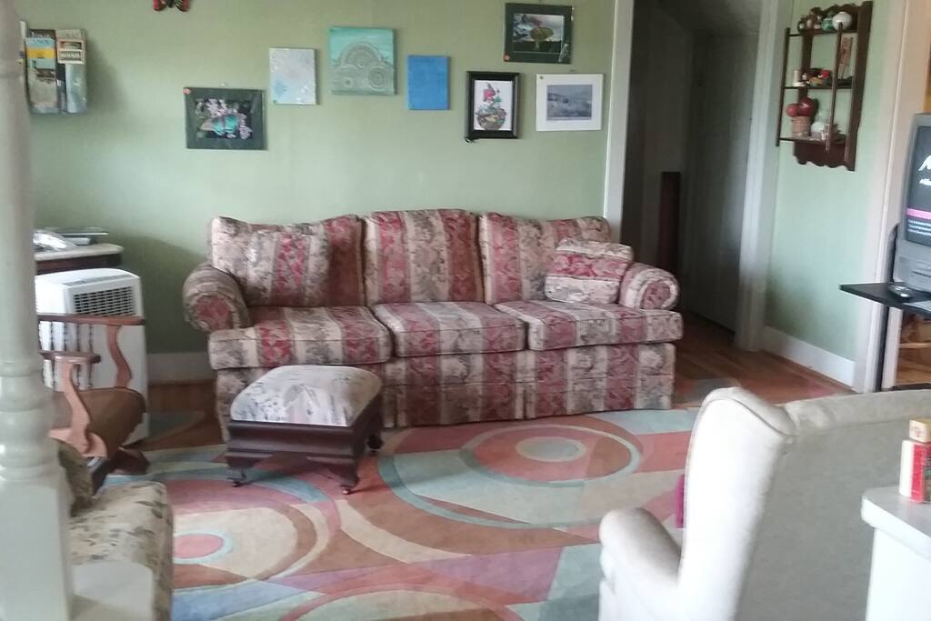 Living room with basic cable TV and DVD's