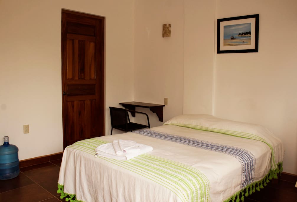 The bedroom with a queen size bed