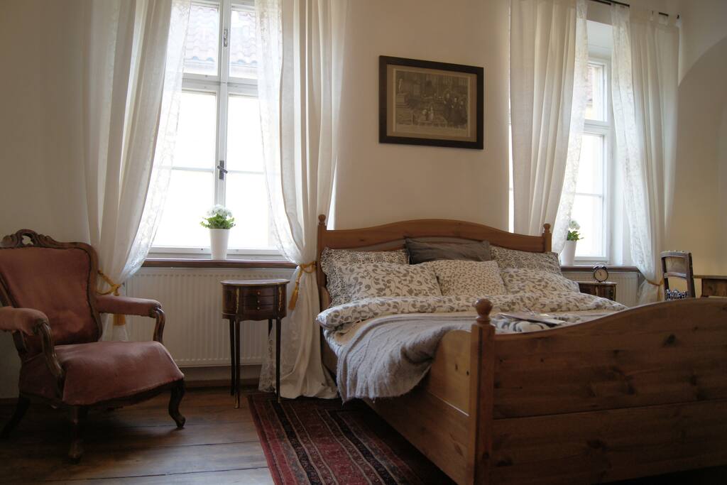 Apartment has one bedroom with king-size bed.