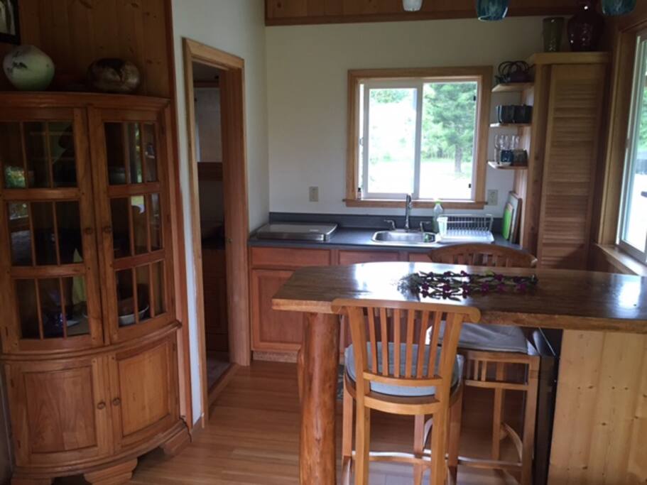 Mango table and teak bar stools