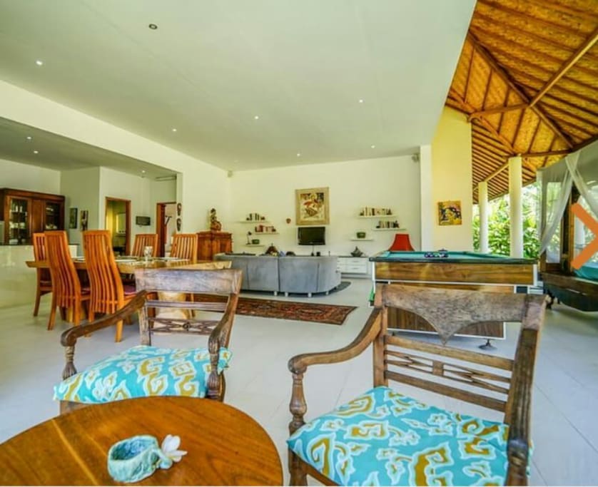 Terrace and Open Livingroom with a Sofa,Pooltable and Canopy