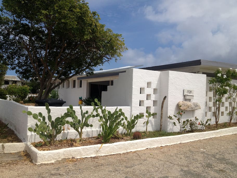 Front part of the house where you can park your car just in front of your room.