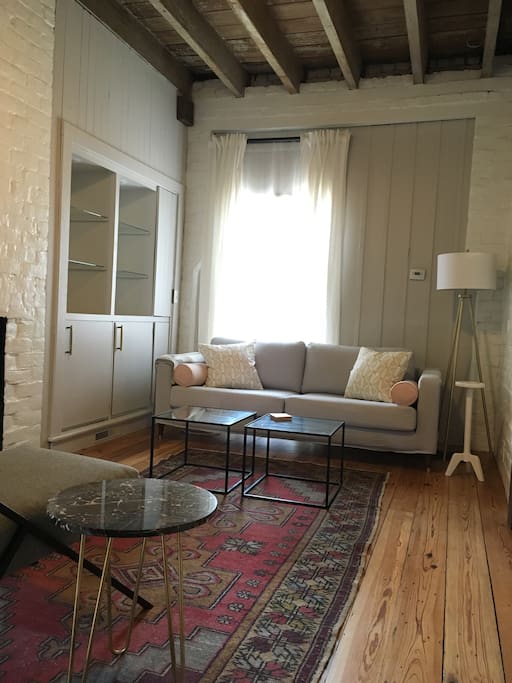 The living room has a separate entrance and can be used as a third bedroom by closing the doors to the kitchen. We will provide a queen air mattress upon request.