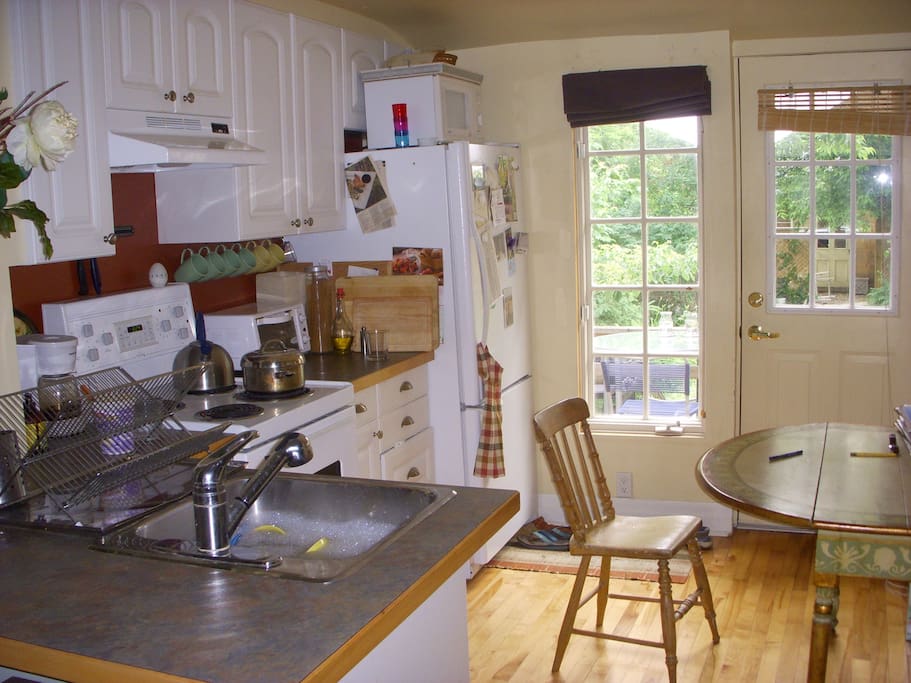 Light filled kitchen over looking the back garden