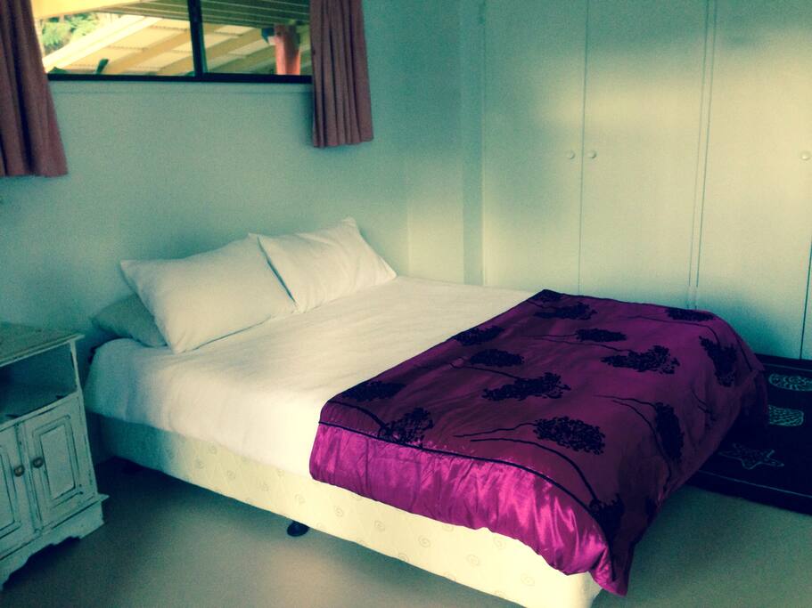 master bedroom with new queen size bed with views to Mt Warning