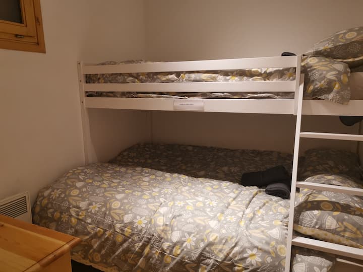 Second bedroom with double bed and single bed