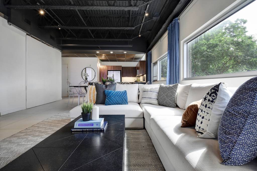 Hip Designer Loft | Walk to 6th Street & Rainey