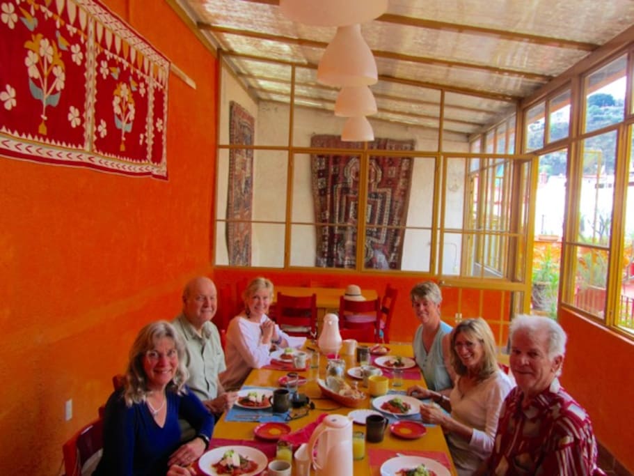 Breakfast room with guests