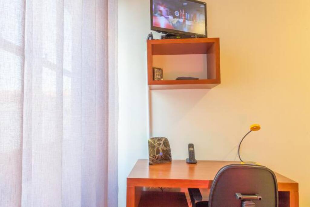 work desk and telephone