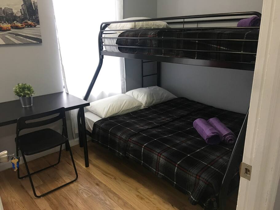 Bedroom with minifridge and smart TV